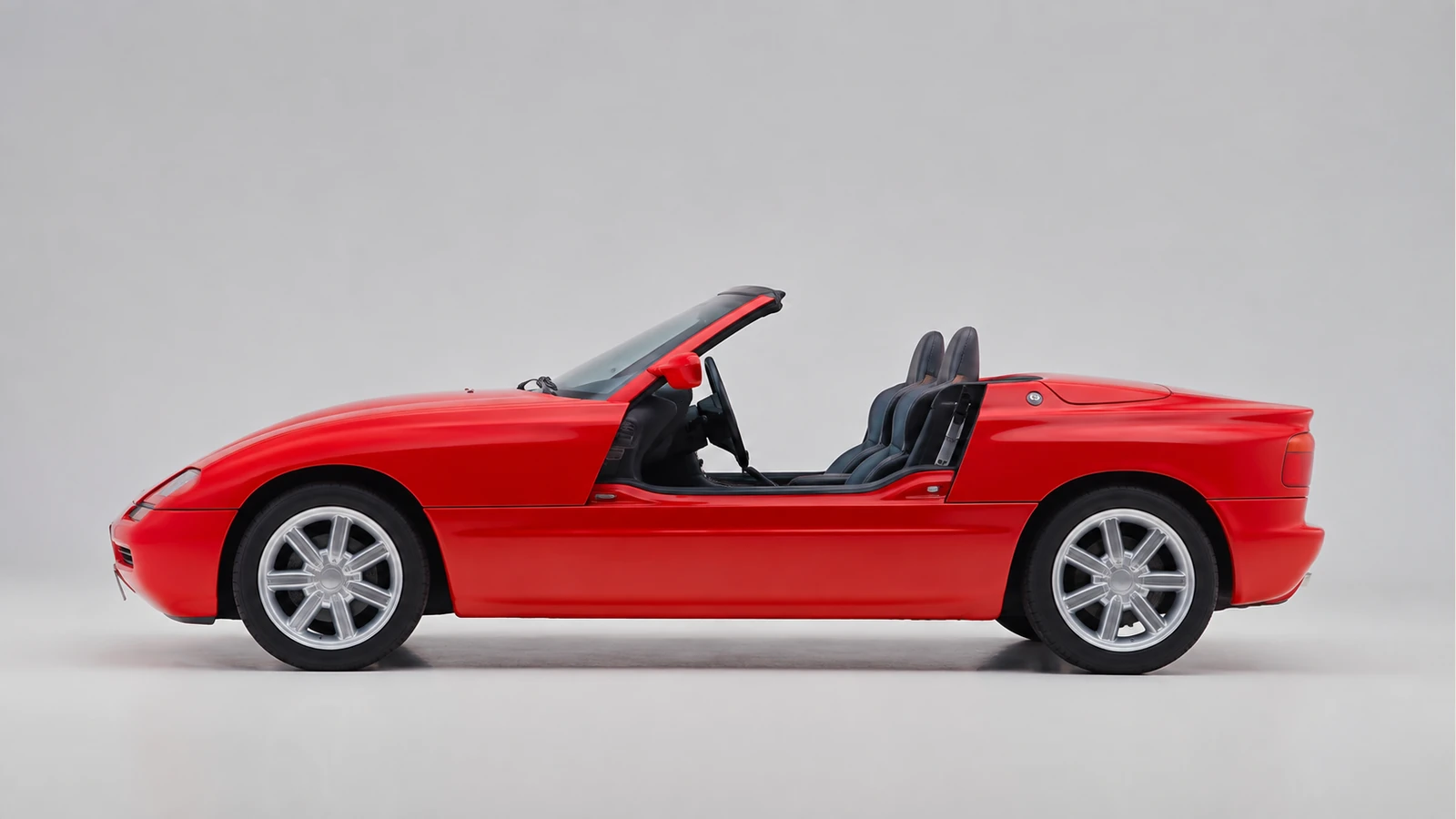 Профиль BMW Z1 с опущенными дверями и штатными семиспицевыми колёсами.
