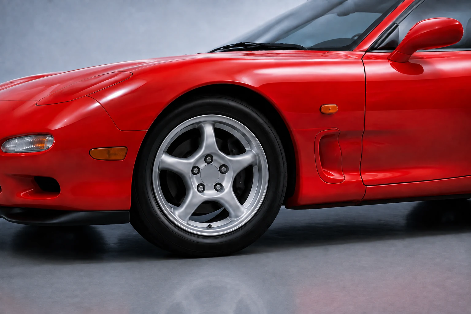 Переднее крыло и пятиспицевое колесо Mazda RX-7 FD