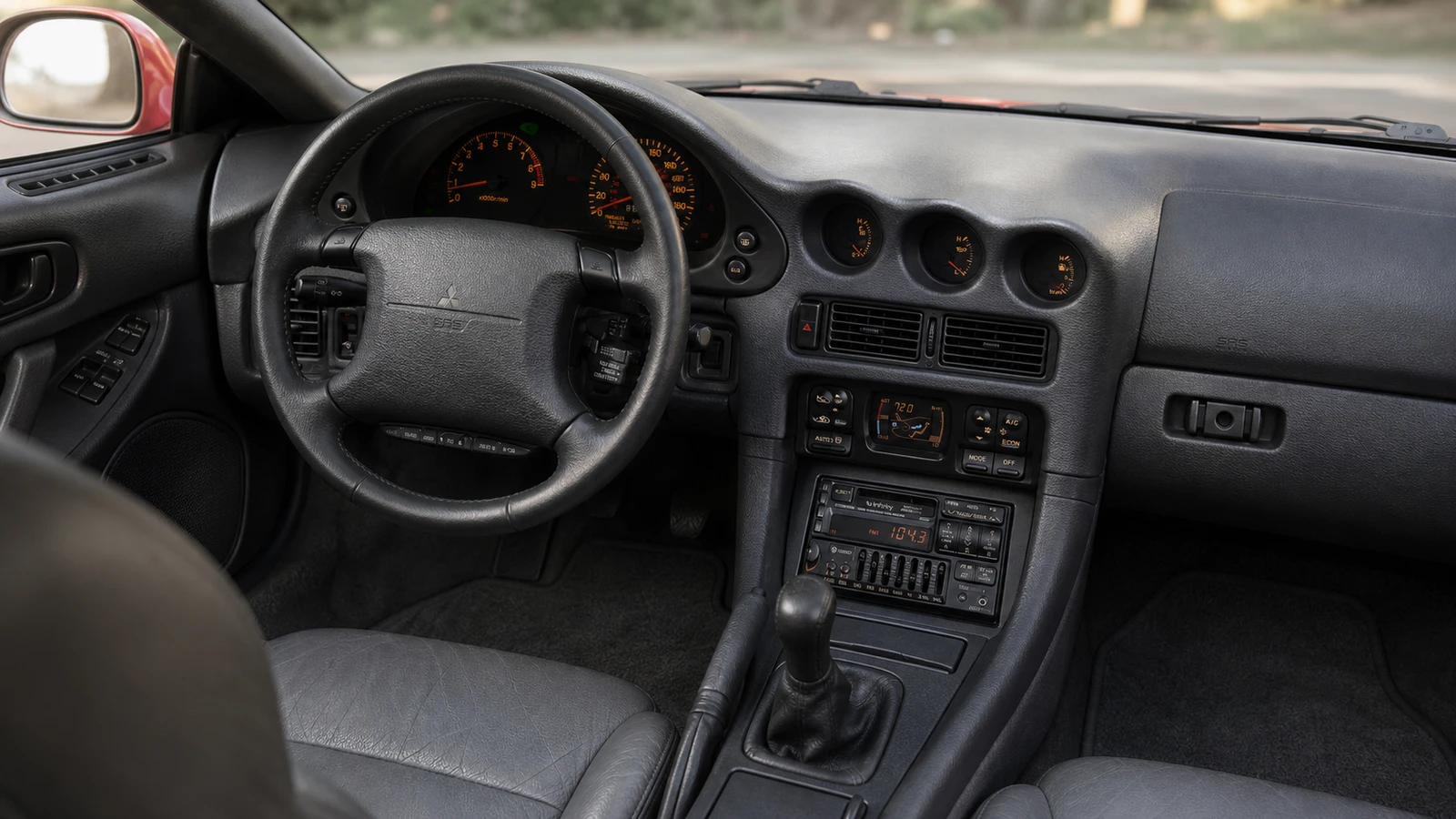 Леворульный салон Mitsubishi 3000GT 1994 года с тремя дополнительными приборами